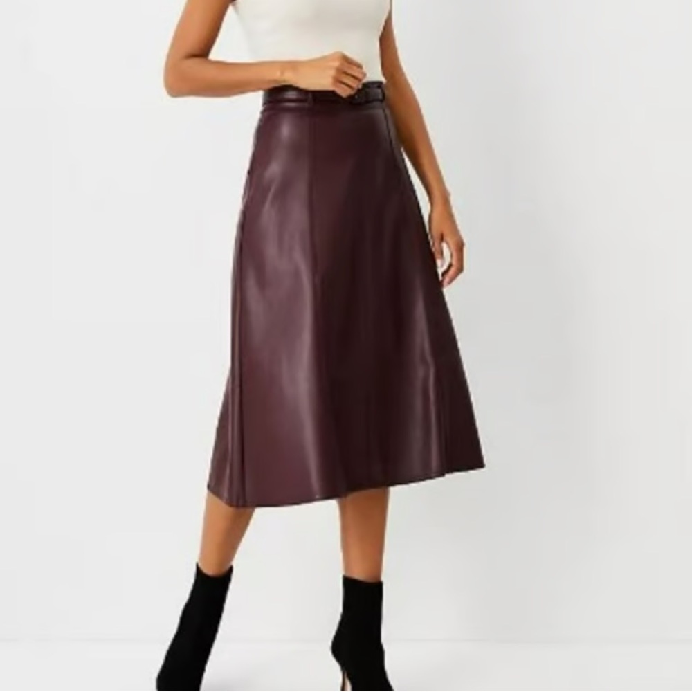 Ann Taylor A-line burgundy leather skirt with belt. Brand new.